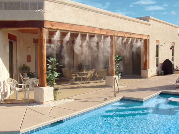 Sunsplash misting system in backyard by pool