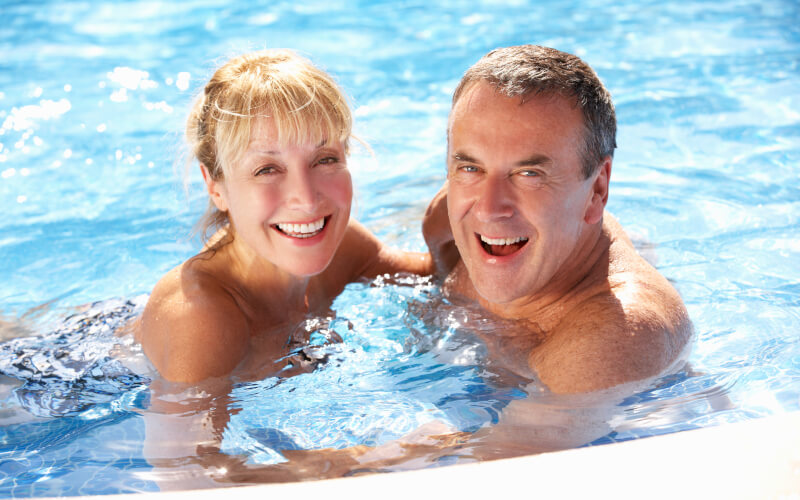 couple swimming in a swimming pool