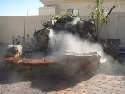 misting fog effects system in backyard near pool