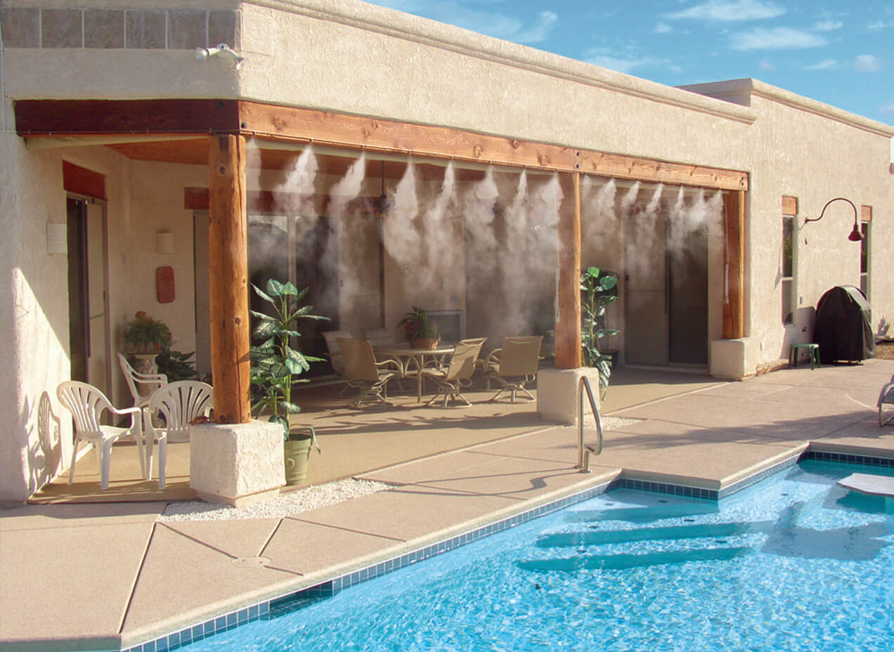 Sunsplash misting system in backyard by pool